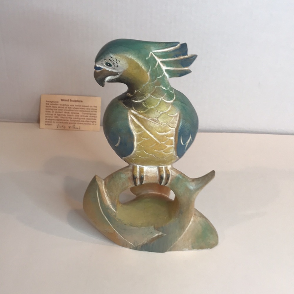 Wooden parrot sculpture